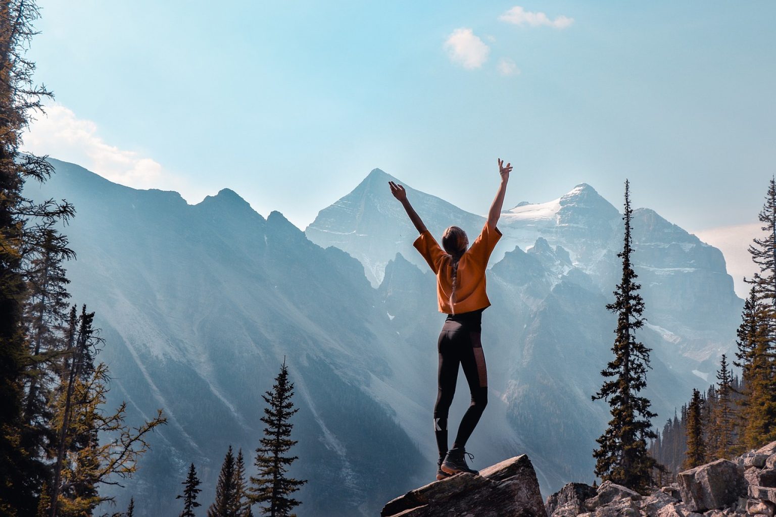 happy girl on mountain top